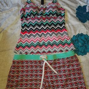 Matching tankini swim top and board shorts